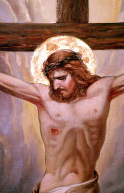 Image of CHRIST’S DEATH ‘LOVE IN ITS MOST RADICAL FORM’ – This depiction of Christ crucified appears on a wall at St. Joseph Church in Trenton, Mich. In his first encyclical, 
