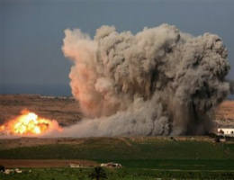Image of An explosion from an Israeli strike in the northern Gaza Strip is seen from the Israel side of the border with Gaza, Saturday, Jan. 3, 2009. Palestinian militants fired rockets into southern Israel Saturday as Israeli warplanes and gunboats blasted more than two dozen Hamas positions, targeting weapons storage facilities, training centers and homes of leaders as its offensive against Gaza's Islamic militant rulers entered a second week.