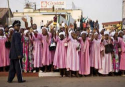 Image of On his second day in the country the pope met with the bishops, accompanied by a celebratory crowd thronging the route of the popemobile.