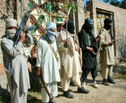 Image of Yesterday a couple accused of having a relation outside of marriage was publicly executed by a group of Islamists in Hangu District near the border with Afghanistan. Pakistan’s Dawn News broadcast the images.