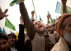 Image of According to NCJP activists, the Taliban attacked the Christians because they were wiping off insulting graffiti from the walls of local homes and the local church.  The Taliban had scribbled words that incited hatred and violence, like ‘Taliban are coming’, ‘Long live Taliban’ and ‘Be prepared to pay Jizia (Tax for non-Muslims) or embrace Islam’.