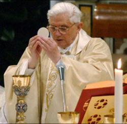 Image of 'With the Eucharist, heaven comes down to earth, God's tomorrow descends into the present moment and time is, as it were, embraced by divine eternity.'