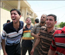 Image of Iraqi Mourners upon hearing the news of the brutal killing of a Christian nurse.