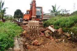 Image of The Bulldozing of a Church in Vietnam.