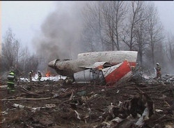 Image of This image from Polish Television's TVP via APTN shows a firefighter walking near some of the wreckage at the crash site where Polish President Lech Kaczynski, his wife and some of the country's most prominent military and civilian leaders died Saturday April 10, 2010 along with dozens of others when the presidential plane crashed as it came in for a landing in thick fog in near Smolensk in western Russia.
