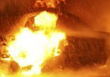 Image of Burning vehicle following a car bombing in front of a Coptic Christian church in the Egyptian city of Alexandria, Egypt, early Saturday Jan. 1, 2011. Photo taken from The Kansas City star, online edition

