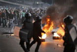 Image of Egyptian protesters clash with police anew over the pace of reform.