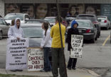 Image of Protesters demonstrate against Planned Parenthood in North Carolina.
