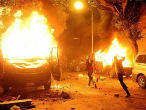 Image of Egyptian protesters storm the Israeli embassy in Cairo on Friday. The military has been accused of delaying their response. 