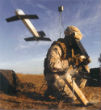 Image of A soldier test launches a Switchblade drone.