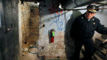 Image of Police Commissioner Charles Ramsey next to the entrance of the dungeon.