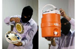 Image of A Lebanese security official shows off some of the sophisticated captured spy equipment.