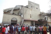 Image of Nigerian catholics outside of St Theresa's catholic Church after the bombing 