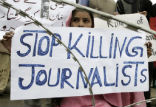 Image of A Pakistani woman protests the killings of journalists. The country cannot be truly free while its people are afraid to report the truth.