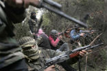 Image of Rebels from the Idlib Province prepare for an ambush earlier in the year, in this file photo. 