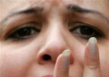 Image of Grieving Coptic Woman  