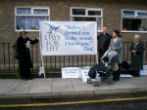 Image of Protesters gather in front of a Marie Stopes International abortion mill. 