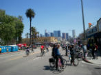 Image of At CicLAvia, cyclists enjoy the city streets without the competition of cars. 