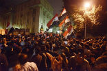 Image of Egyptian protesters gather outside of the presidential palace to protest Mohammed Morsi's new powers.