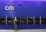 Image of Citibank is cutting jobs and costs in the face of new regulations and fiscal uncertainty. 
