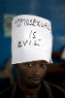 Image of A supporter of the bill provides his opinion on the matter during a public demonstration. 