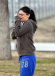 Image of A woman cries suggesting the trauma felt by even those who were not in the line of fire. 