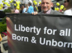 Image of Pro-life advocates rally in support of the new laws in Arkansas. 