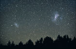Image of The Large Magellanic Cloud is visible in the Southern Hemisphere and is a satellite galaxy of the Milky Way.