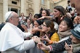 Image of Pope Francis passing through the crowd of pilgrims who gather for his Wednesday teaching