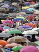 Image of VATICAN CITY (Catholic Online) - With his characteristic affection for God's people, Pope Francis showed no concern for the rain as he moved through the crowd who gathered to hear his Wednesday talk.