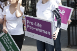 Image of Pro-life and pro-woman demonstrators in Ireland protest against the bill which threatens the lives of Irish children.