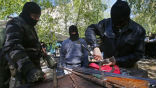 Image of Pro-Russian separatists refurbish rifles in Eastern Ukraine.