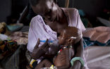 Image of This child is receiving medical care, but the odds are poor. Even those under the care of humanitarian agencies are in grave danger as resources run out. 