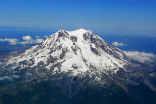 Image of Mount Rainier is the tallest volcano and the fifth-highest peak in the contiguous United States, towering more than 14,400 feet.
