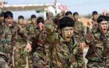 Image of Kurdish fighters have engaged militants belonging to the new Islamic State after watching the fighting for nearly four months.