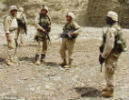 Image of An American general was killed and 14 coalition troops were wounded in an attack in a Kabul training center.