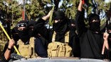 Image of Fighters from the Islamic State in their signature black uniforms. The group has taken numerous cities and has now replaced al-Qaeda as the go-to group for jihadists.