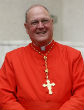 Image of Cardinal Timothy Dolan of New York is behind the parish restructuring, which is intended to balance the parishes of the archdiocese of New York to line up with the Catholic population.