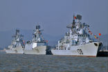 Image of China's ongoing project of building islands for military use in the South China Sea is seen by many as confrontational and preparation for war.