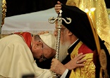 Image of I pray that this prophetic action of Pope Francis - humbly seeking the blessing of Patriarch Bartholomew - hastens the healing of the divisions which separate the Church of Jesus Christ. I believe it shook the gates of hell. May it now release the power of the Holy Spirit and unleash a new missionary age of the Church. 
