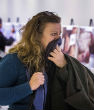 Image of Complete disgust and shock painted the faces of New Yorkers entering the photo exhibit.