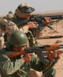 Image of A U.S. Marine and a Moroccan army soldier train together, part of a growing number of programs where Western militaries conduct drills with African nations in order to help them combat Islamic jihadists.