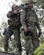 Image of The FBI, U.S. marshals, SWAT, ATF, K9 units and Chicago police all search for the three suspects.