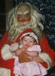 Image of Creepy Santa pictures -Some kids didn't mind while others could only scream and struggle to get away (Tumblr).