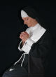 Image of A nun who has yet to be identified saved a man after a tree pinned him to the ground (wiseGEEK).