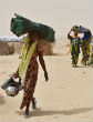 Image of Displaced families continue to migrate to safer regions (AFP).