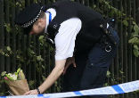 Image of Mentally ill man murders an American and injured five passers-by (PA).