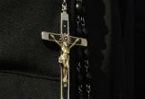 Image of Lesbian muggers rob nun of her rosary beads.