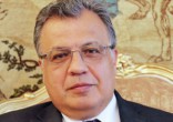 Image of An unidentified gunman shot Russian Ambassador to Turkey Andrei Karlov before a shocked crowd.