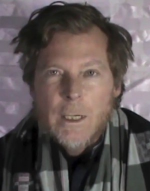 Timothy Weekes (of Australia) begs for help from the American Government (YouTube screenshot).
